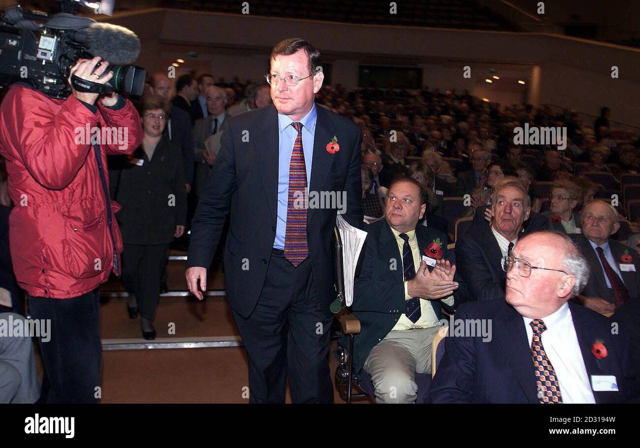 Ulster Unionist leader David Trimble (R) at Belfast's Waterfront Hall, to address his 800 strong Ulster Unionist Council. Trimble is trying to reassure dissidents within his party, that they should not pull out of Goverment with Sinn Fein.  * over the lack of decommissioning of IRA weapons. With Party Chairman Lord Rogan. Stock Photo