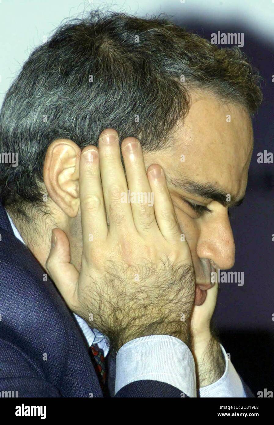 Garry Kasparov concentrates during his opening game against Vladimir Kramnik at the World Championship Chess finals at Riverside Studios in London. Stock Photo