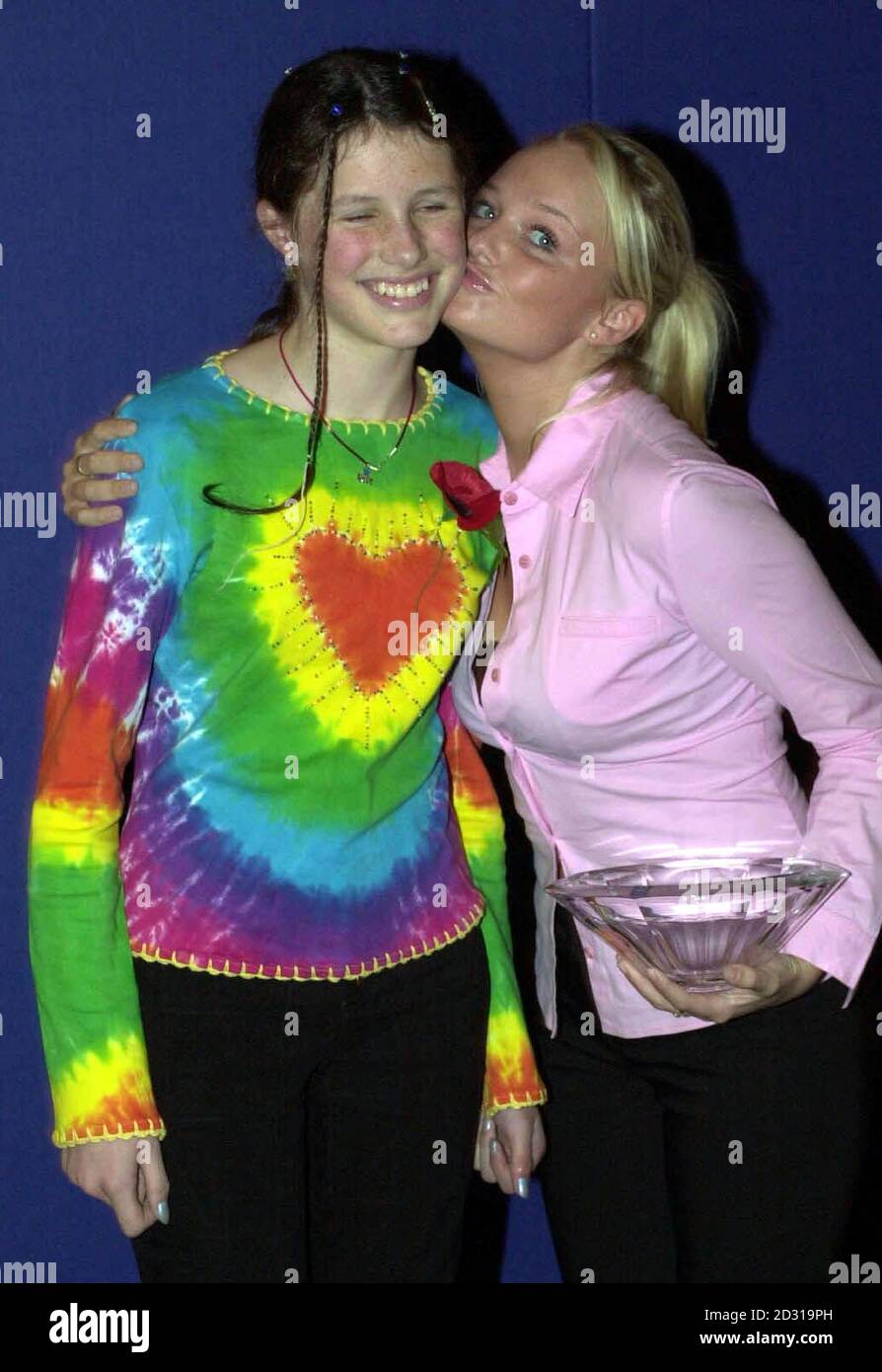 People of The Year 2000 award winner Josie Russell (left) with Spice Girl Emma Bunton, who presented the glass trophy to her in Park Lane, London. Stock Photo