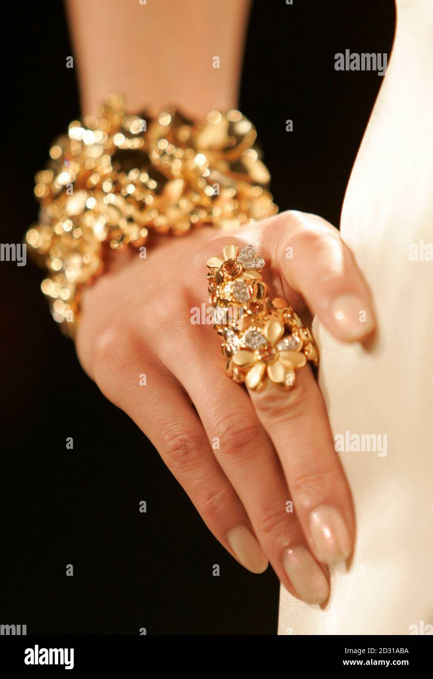 A Model Poses In Gold Jewellery At The Gold Expressions Fashion Show Hosted By Ginza Tanaka In Tokyo March 28 08 Reuters Michael Caronna Japan Stock Photo Alamy