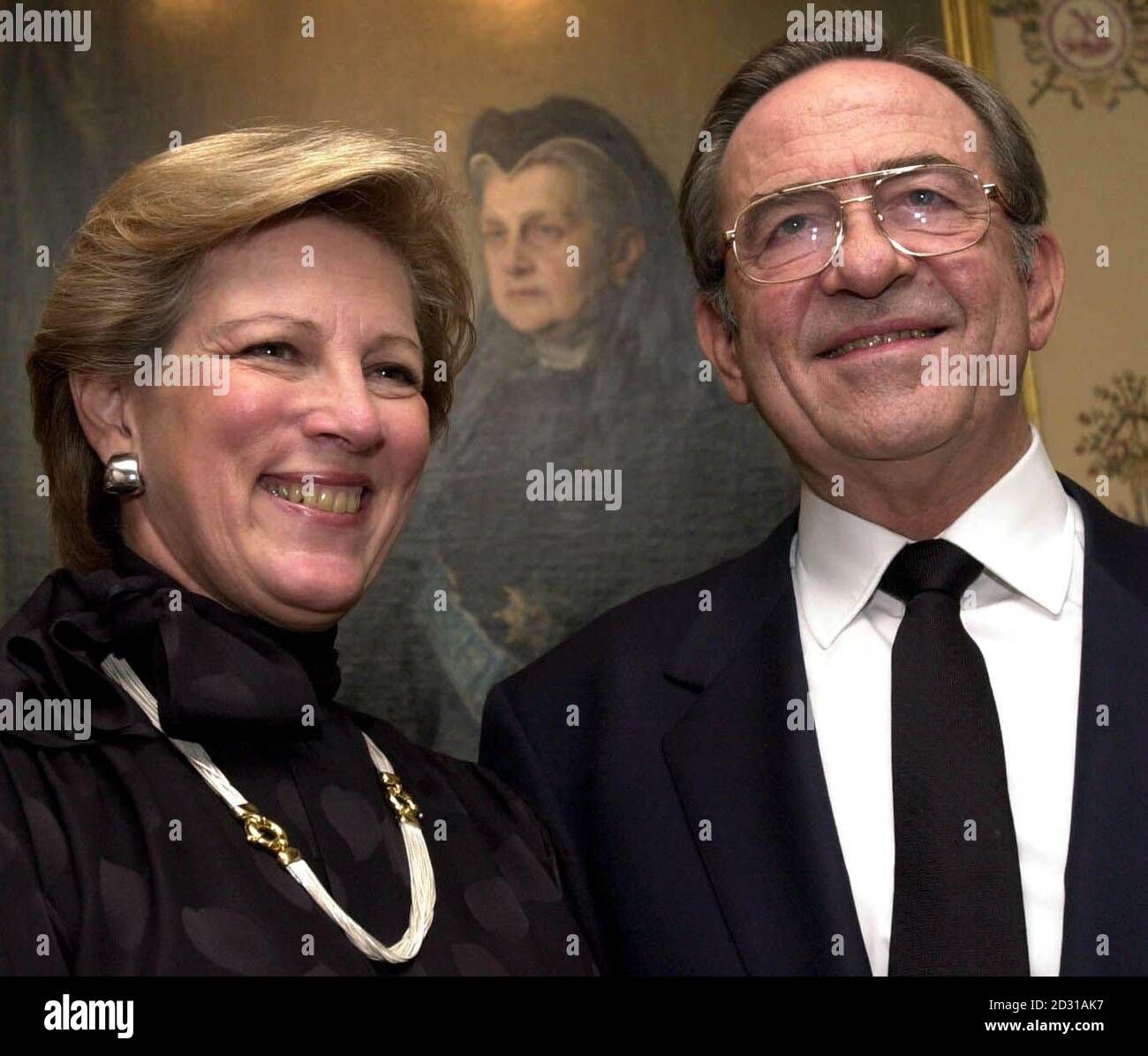 King Constantine of Greece with wife Queen Anne-Marie at their home in north London. The exiled king is 'extremely grateful' after the European Court of Human Rights ruled that Constantine's human rights had been violated when his property was seized in Greece.   *... They are in front of a portrait of his Great Grandmother Queen Olga who is also the Grandmother of Britain's Prince Philip. Stock Photo