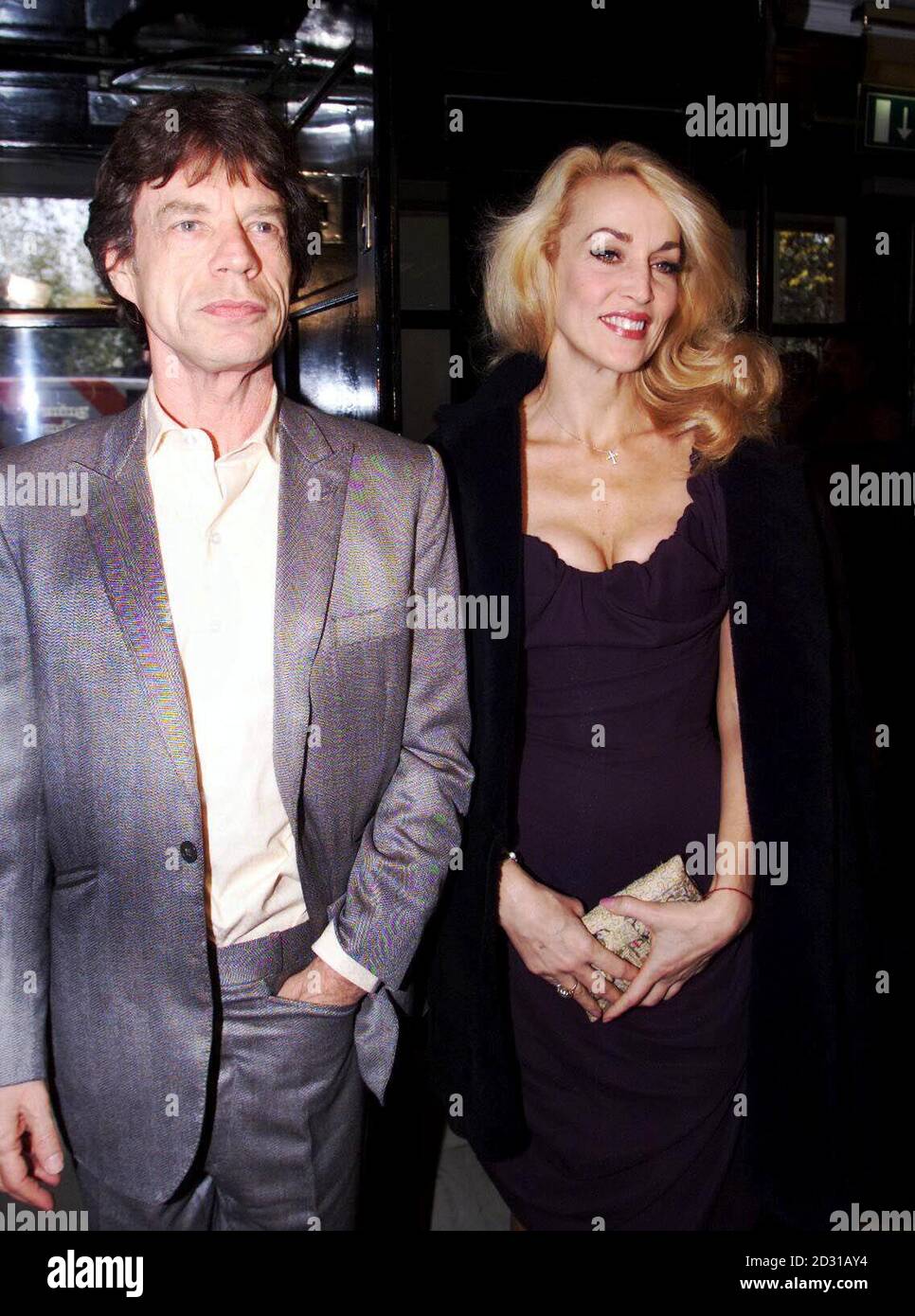 Model Jerry Hall and Rolling Stones singer Mick Jagger arrive at the Evening Standard Drama Awards at the Savoy Hotel, in central London. Stock Photo