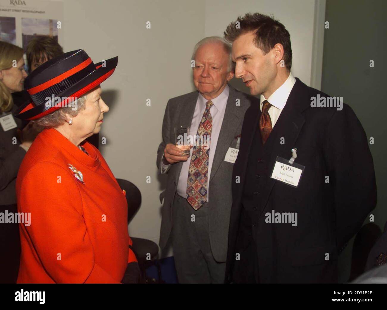 The Queen meets actor Ralph Fiennes at the opening of the new premises of the Royal Academy of Dramatic Art in London. During the visit, the Queen, accompanied by Lord Attenborough, met students and celebrities linked to the academy. Stock Photo