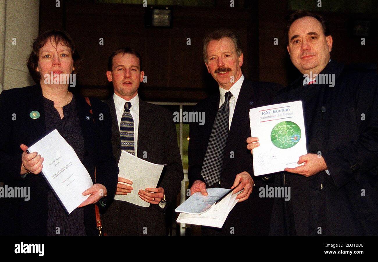 (L-R) Councillor Alison McInnes, Jamie Bell, Alan Campbell, and former SNP leader Alex Salmond, on their arrival at the Ministry of Defence in London, to present a petition over changes at RAF Buchan airbase.   * The threat of an immediate blow to the local economy around the Scottish airbase was eased when MoD chiefs said the rundown would not take full effect for four years. The move was announced when Salmond and a deputation from Aberdeenshire met UK Armed Forces Minister John Spellar in London. They had sought the meeting over the future of the base, in Mr Salmond's Banff and Buchan const Stock Photo