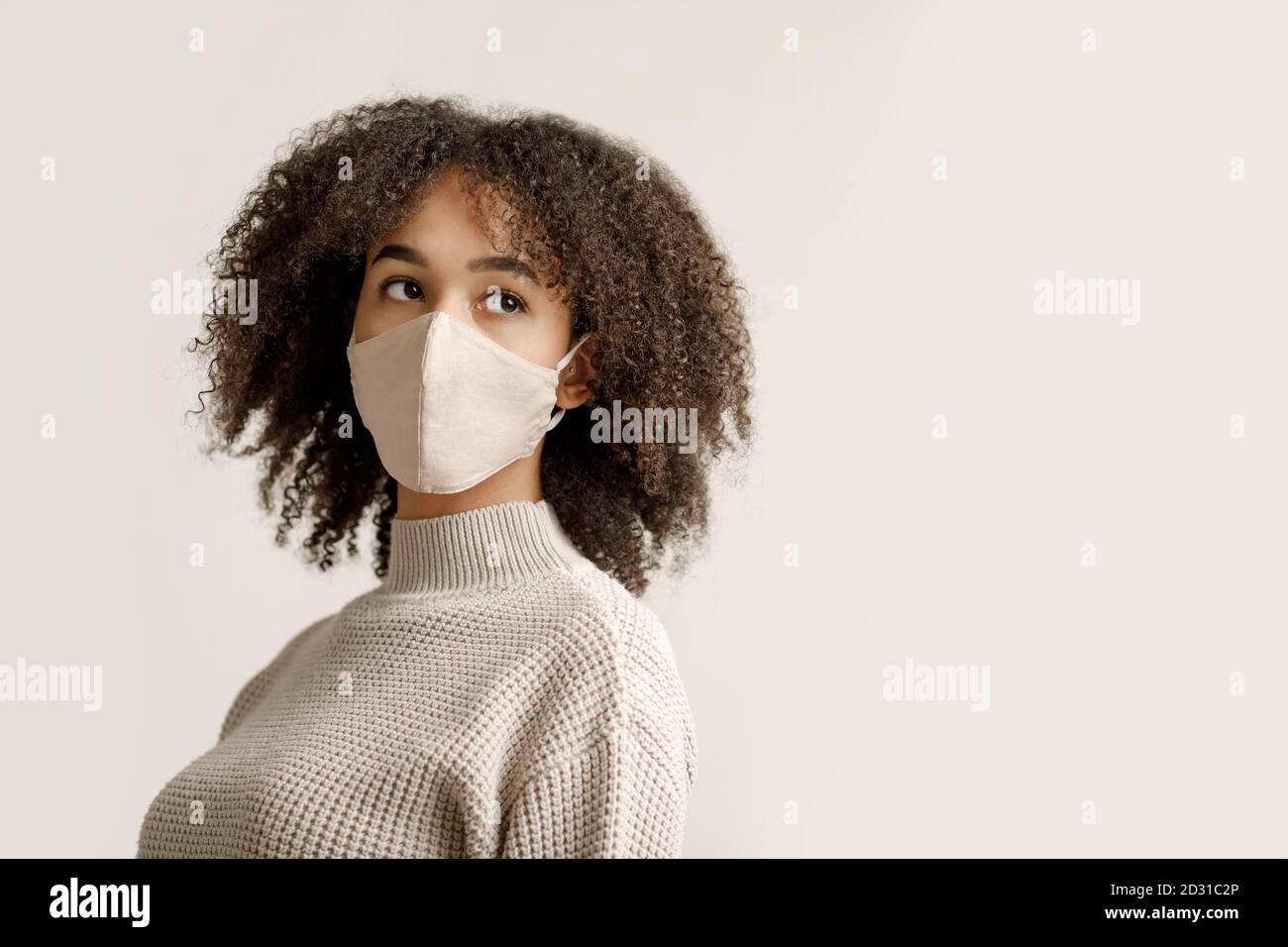 Cold, flu and virus, respiratory disease, quarantine and epidemic. African american young woman looking to the side Stock Photo