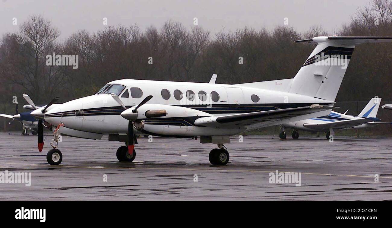 A Beech 200 on the tarmac at Blackbushe Airport near Yateley, Hampshire. Officials were carrying out post-mortem examinations on five people killed when  a twin-engined Beech 200 turbo ploughed into a factory shortly after taking off.  * from Blackbushe airport near Yateley, Hampshire, on Saturday.  Stock Photo