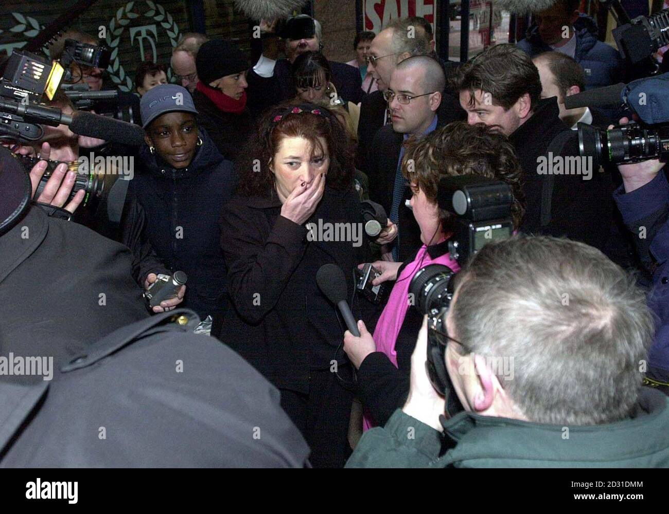 Alan (centre, top) and Judith Kilshaw (centre), of Buckley, north Wales, arrive at the  High Court in Birmingham, where they are continuing their battle to retain custody of twins who they adopted through the internet.    * The couple, who adopted the children from their American birth-mother after paying  8,200 to a Californian internet adoption agency, are contesting a decision by social services at Flintshire County Council to take the babies from them.   Stock Photo