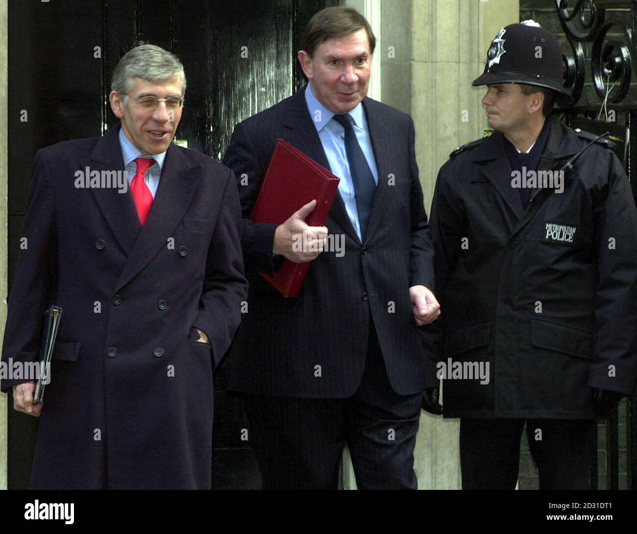 British Home Secretary Jack Straw (left) leaves a cabinet meeting at 10 Downing Street with Lord Irving, the Lord Chancellor. It was the first meeting of the cabinet since the cabinet mini-reshuffle after the resignation of Peter Mandelson. *...over a row about a passport application for an Indian businessman. 29/04/02: Unions warned of a strike across Britain's naval bases on the anniversary of D-Day unless guarantees were met over plans to move civilian jobs to the private sector. The unions have claimed that 1,000 warship support jobs would be lost and up to 3,000 privatised under the Gov Stock Photo