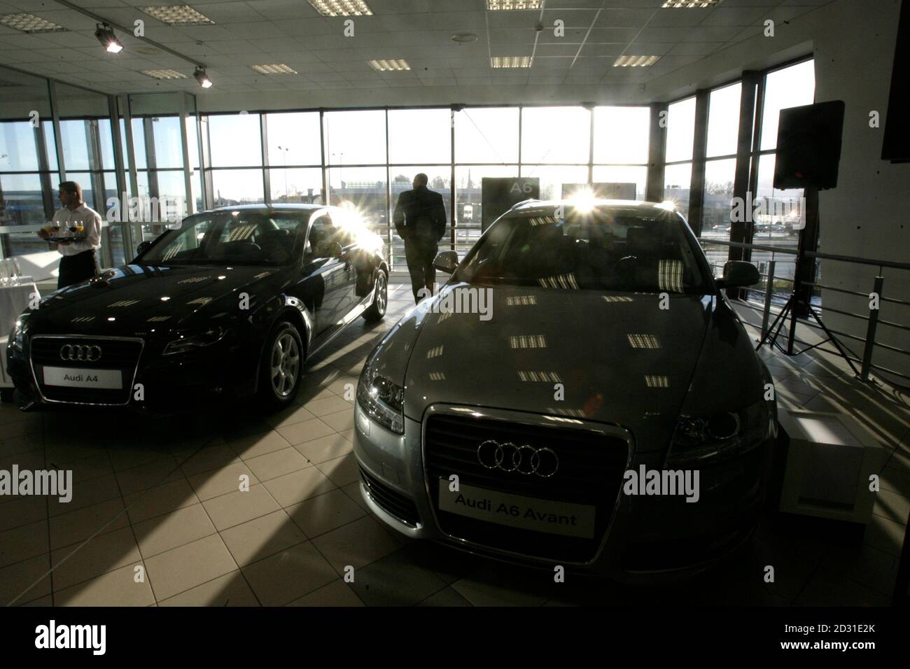 Audi Car Dealer And Service Centre Staff Wait For Media Before The Official Opening Of Their New Store In Riga November 19 2008 The Latvian New Car Market Shrank 33 7 Percent Between