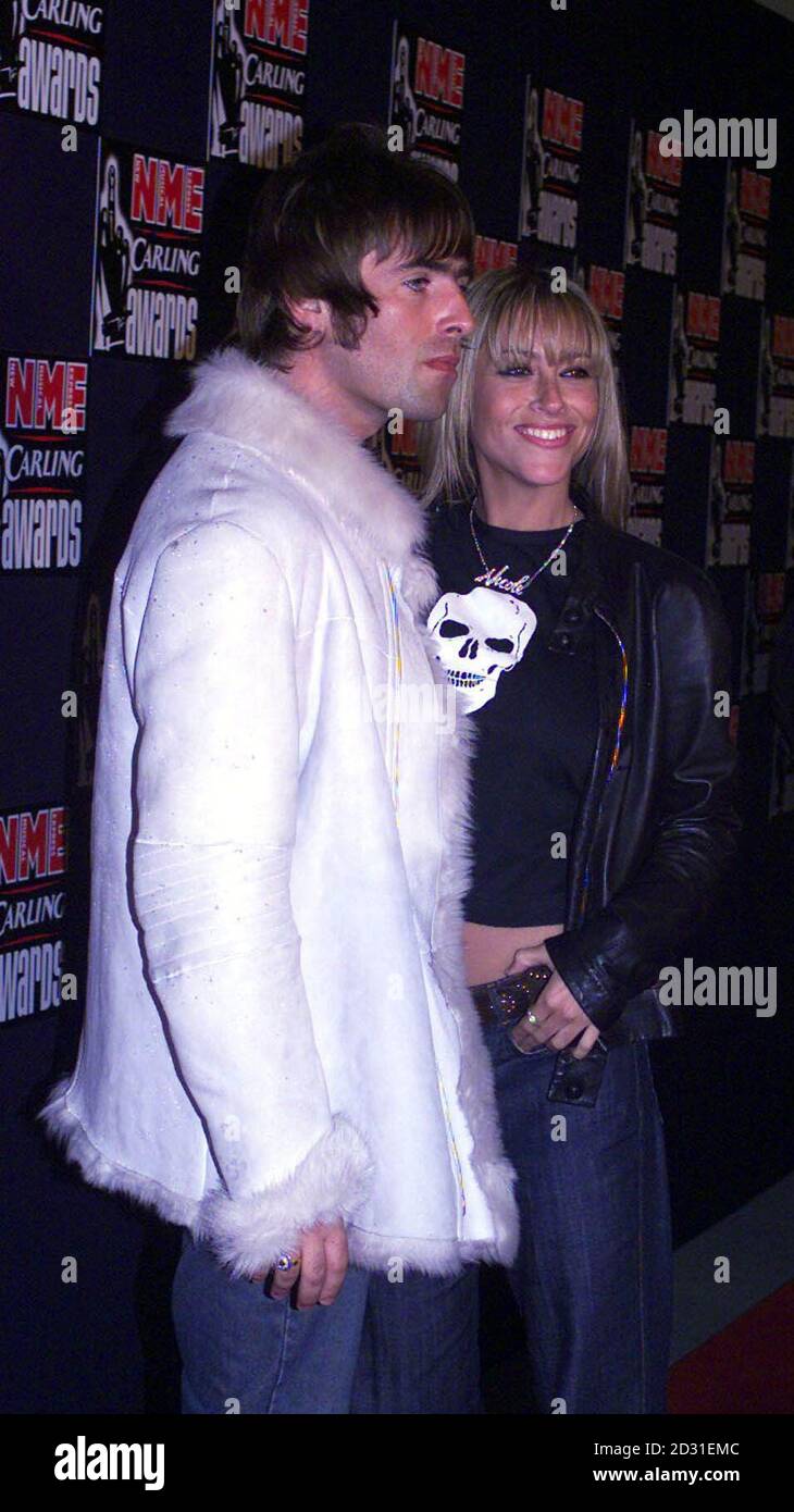 Liam Gallagher (left) from the pop group Oasis, and his girlfriend Nicole Appleton arriving at the NME Carling Awards at The Planit Arches, Shoreditch, east London. Stock Photo