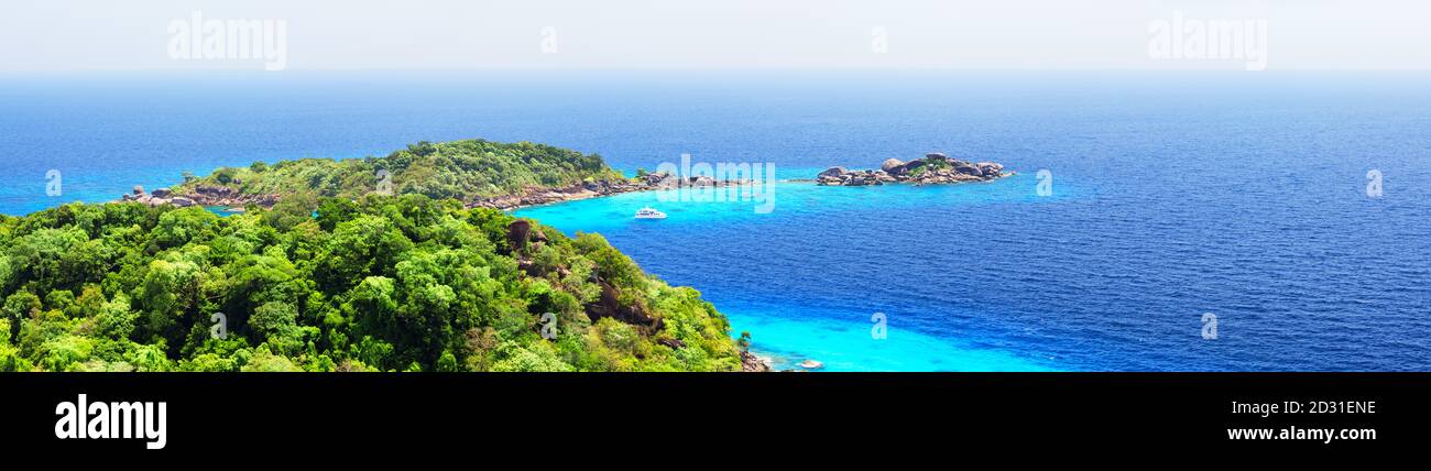 Panoramic view of beautiful beach and blue sky in Similan islands, Thailand. Vacation holidays background wallpaper. View of nice tropical beach. Pano Stock Photo