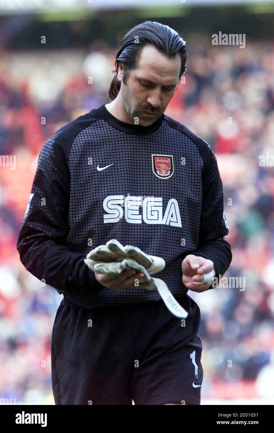 Arsenal goalkeeper David Seaman is left shocked and stunned as he leaves  the pitch, following his sides 6-1 defeat by Manchester United in the  Premiership football match at Old Trafford, Manchester Stock