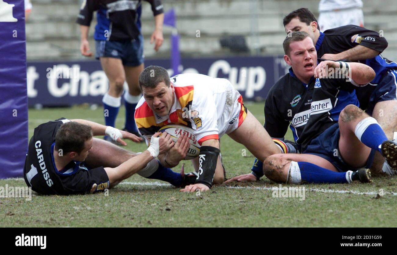 Halifax Blue Soxs Daryl Cardiss (left) and Andy Hobson can only watch as Bradford Bulls James Lowes (centre) scores the opening try during the Challenge Cup fifth round match at the New