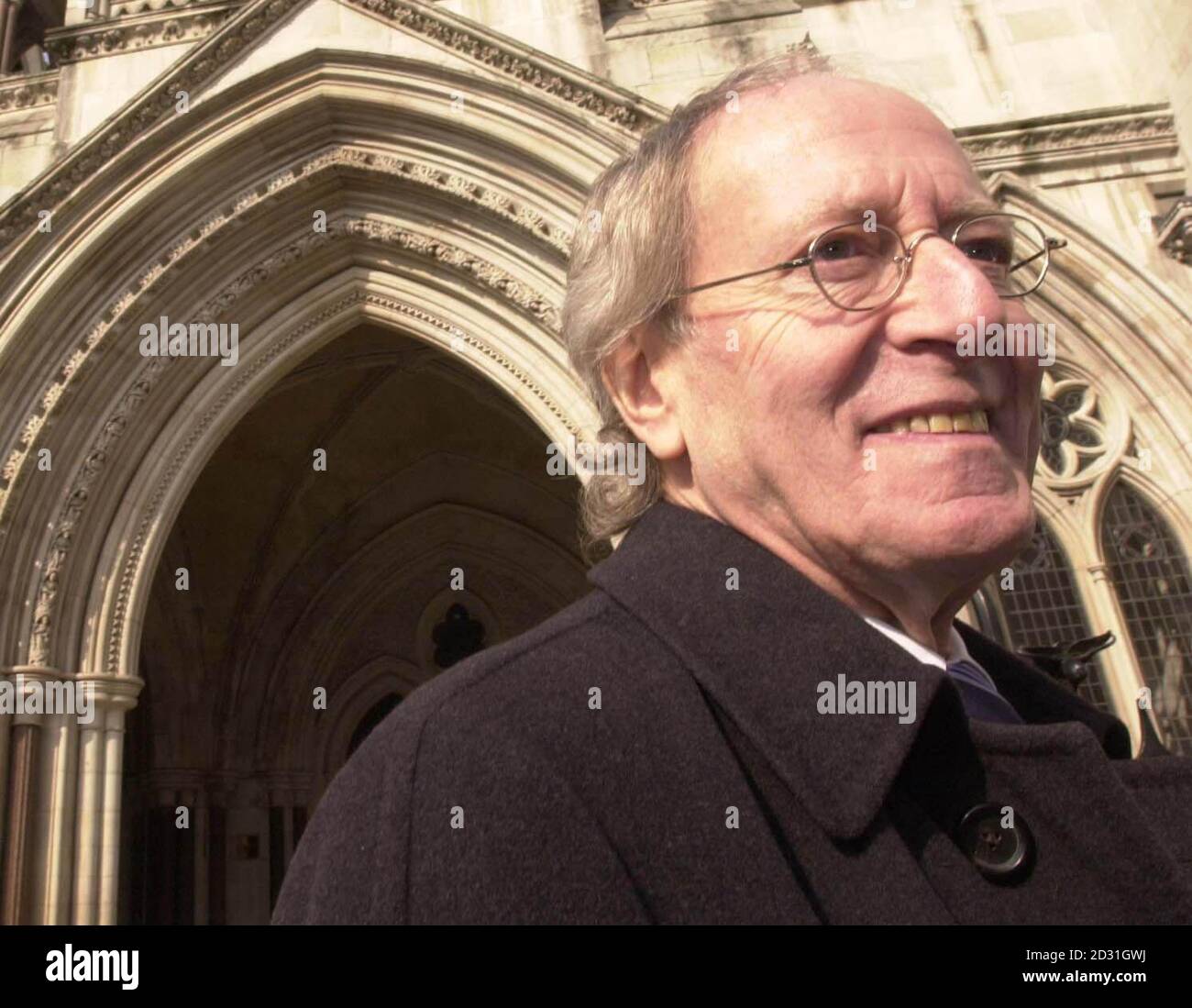 Composer John Barry outside the High Court. Fellow composer, the award-winning Monty Norman was suing The Sunday Times for libel for reporting in an October 1997 article that he did not write the James Bond theme.   * Mr Norman's counsel, James Price QC, told Mr Justice Eady and the jury that the two-week case centred on whether the theme's composer was Mr Norman or John Barry.  Stock Photo