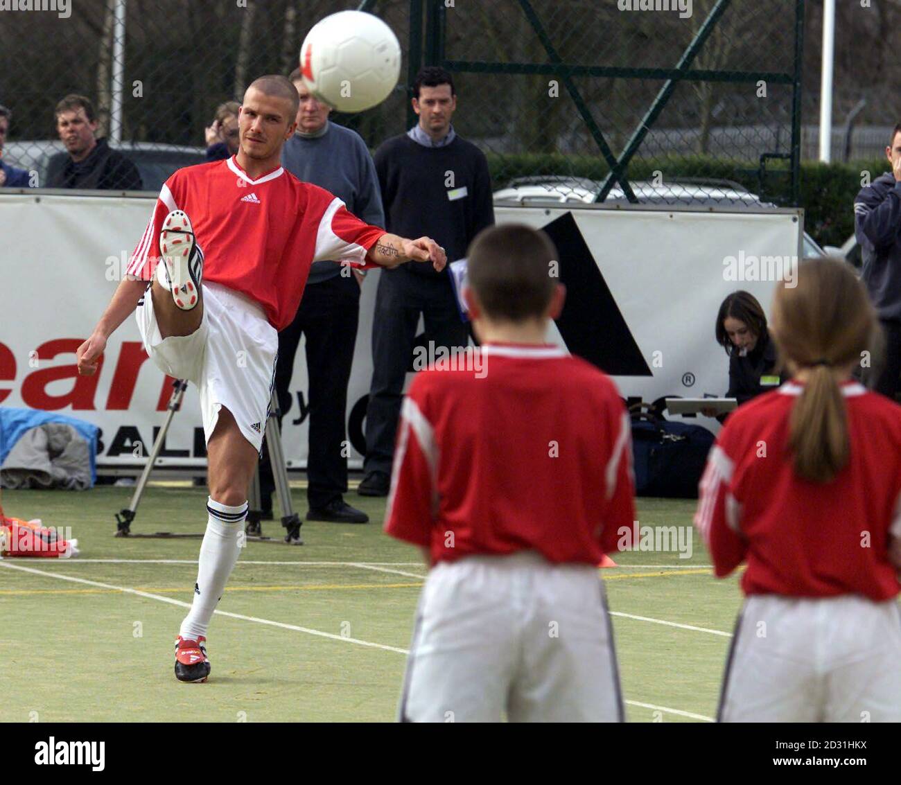 Manchester United and 'Adidas Ambassador' David Beckham demonstrates his  football skills at the launch of a schools football initiative at Adidas'  Stockport base. The scheme has been written by teachers and is