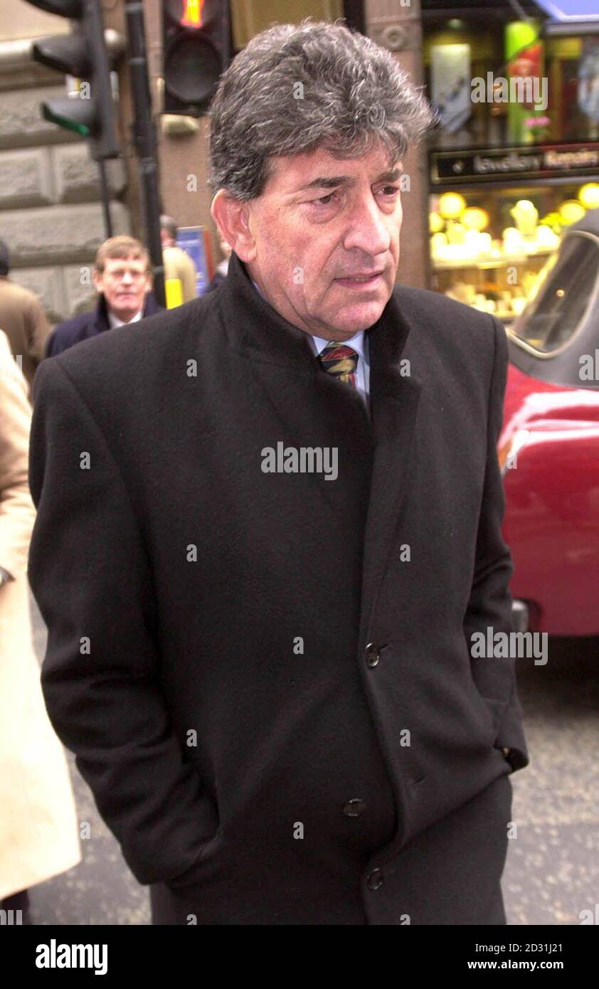 Michael Cowan outside the Court of Appeal in London, Tuesday 20 March 2001, where the court heard that he was an 'entrepreneurial genius' who should not have split equally his  12 million fortune with the wife he divorced after 35 years of marriage.    *Jacqueline Cowan, 62, is seeking from her former husband almost  1 million on top of the  1,775,000 lump sum, and homes in the United States and Britain worth around  1,400,000, she has already been awarded.   Stock Photo