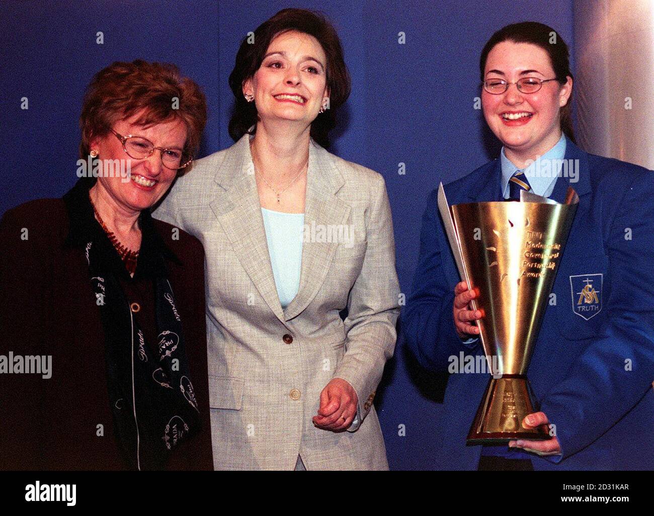 Prime Minister's wife Cherie Booth (centre), presents St Mary's College from Londonderry in Northern Ireland's Head Girl Laura McLaughlan (R) and Headmistress Dame Geraldine Keegan with the 2001 TNT Moderning Government Partnership Award.  *   at a presentation ceremony at London's Savoy. The college won the award for dramatically increasing standards in academic achievement through partnership working.  Stock Photo