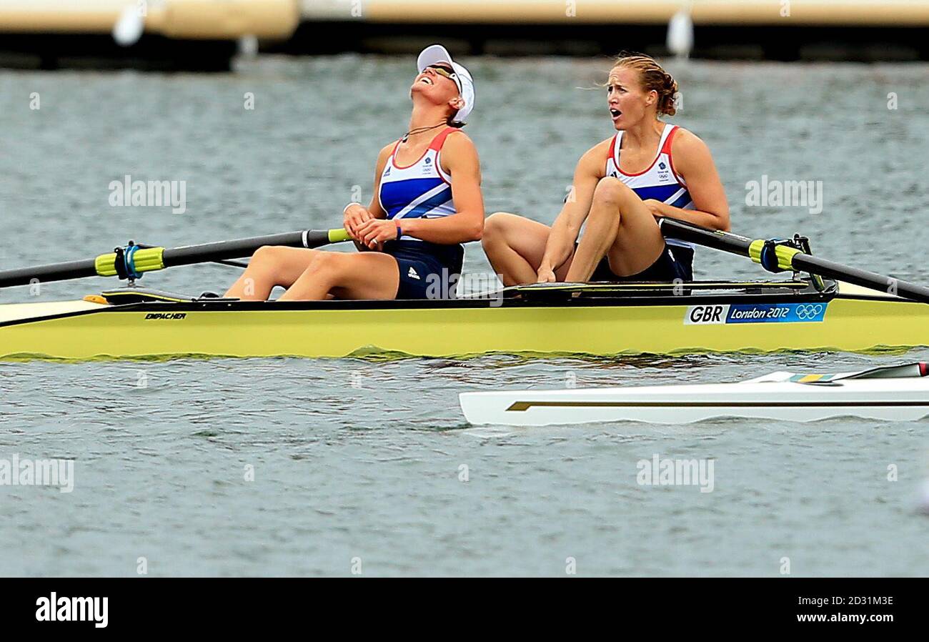Great Britain's Helen Glover and Heather Stanning celebrate winning gold in the women's pair final at Eton Dorney Lake, London. Stock Photo