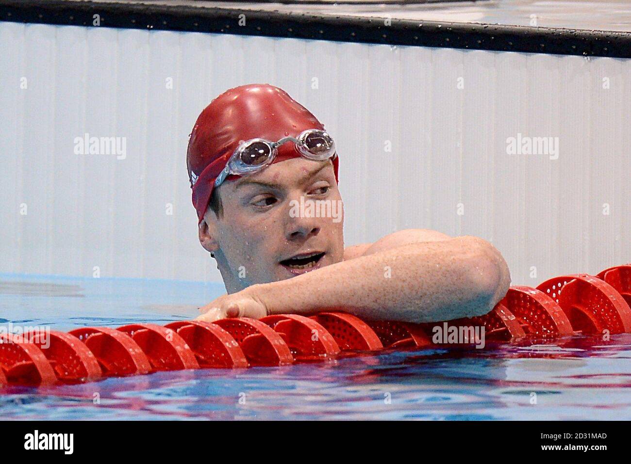Great Britain's Michael Rock after finishing seventh in his Men's 100m Butterfly Heat 4 at the Aquatics Centre, London. Stock Photo