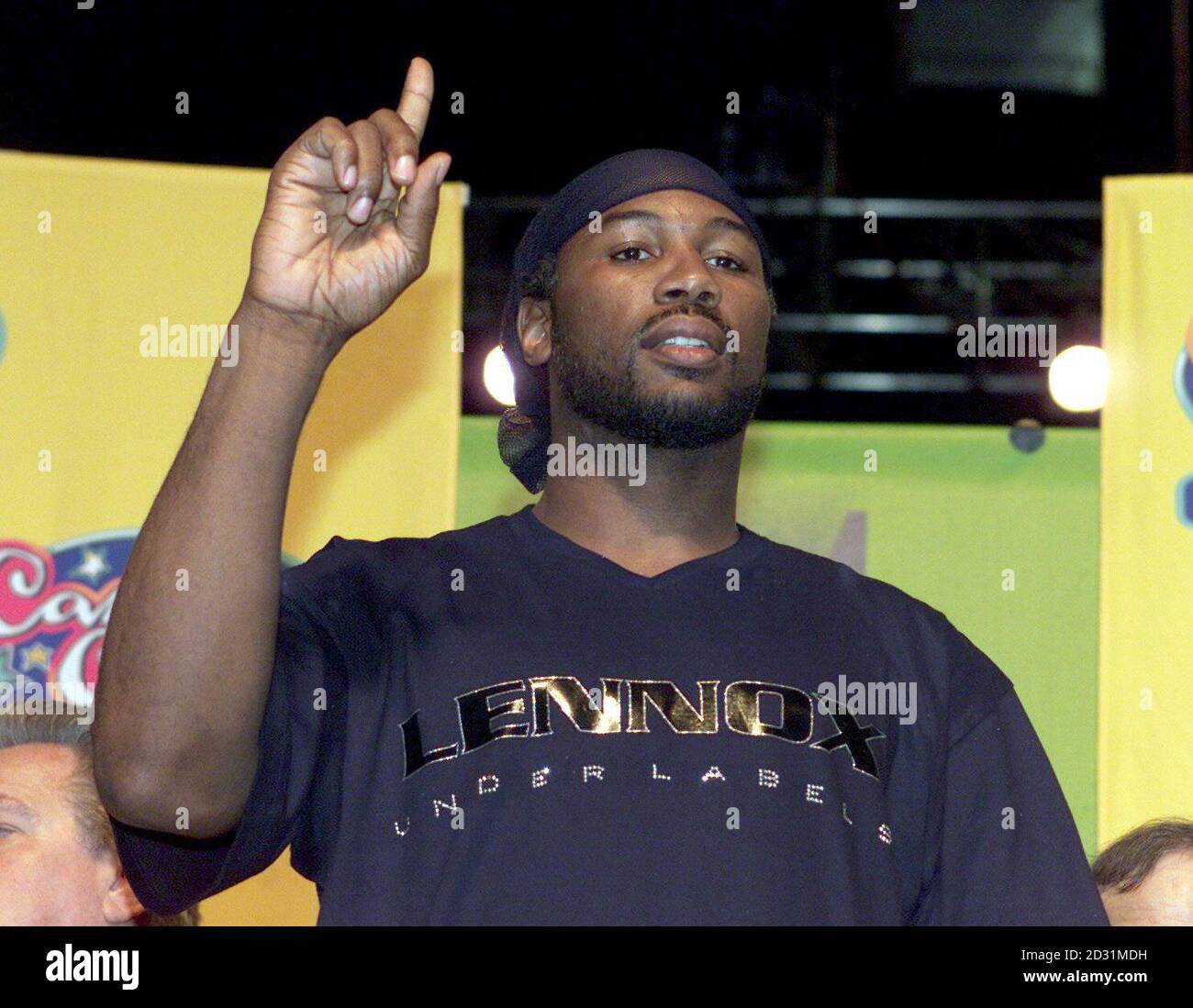 Britain's World Heavyweight boxing Champion Lennox Lewis gestures