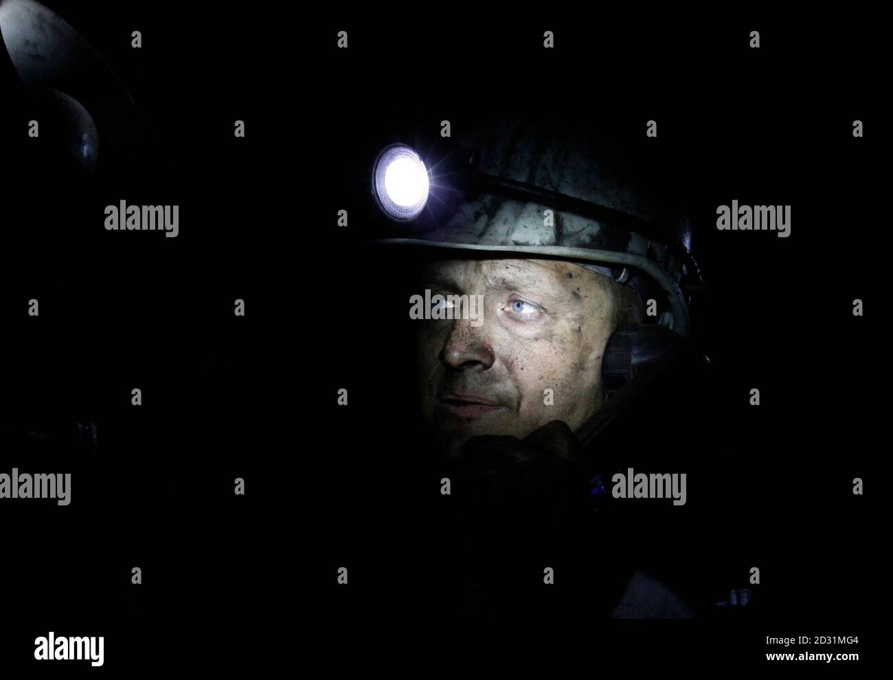 A Miner Speaks On The Phone In A Komsomolskaya Coal Mine 1080 Meters (3543 Feet) Under The Surface In The City Of Vorkuta, 2268 Km (1409 Miles) North Of Moscow, December 30,