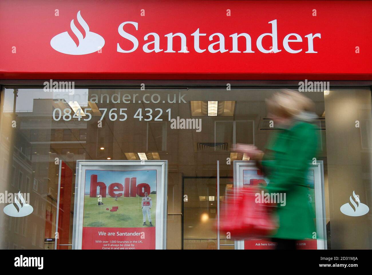 A Pedestrian Walks Past A Branch Of A Santander Bank In London January 11 10 Spanish Lender Banco Santander Will Look For Opportunities To Buy Assets In Britain As The Country S State Rescued