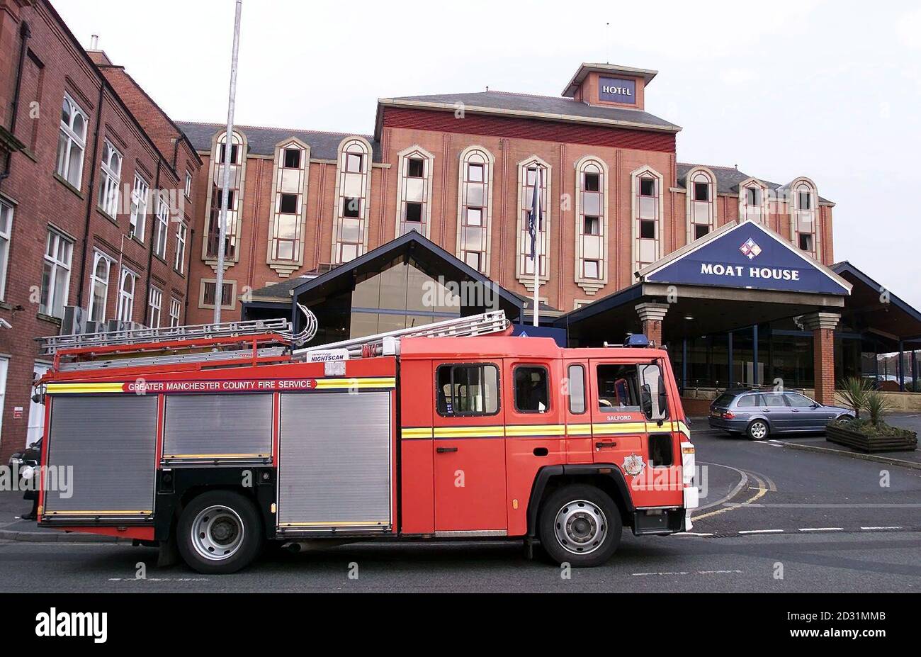A fire engine stands outside the Bolton Moathouse, where two people died in a severe blaze in the early hours of the morning. Greater Manchester Fire Service were called to the fire and hotel staff evacuated most of the 128 guests as the blaze took hold on the third floor.  * a fire service spokesman said. Firefighters wearing breathing apparatus searched the hotel and a man and a woman were found in a corridor on the third floor and were later pronounced dead at Bolton Royal Hospital, the spokesman added.  Stock Photo