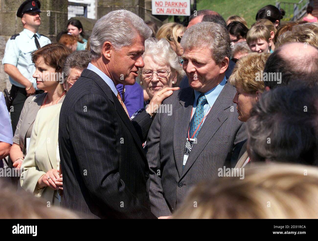 Former United States President Bill Clinton (centre left) chats with Sam Blair and other relatives who lost loved ones in the Enniskillen Poppy Day bombing in November 1987. Mr Clinton was in Enniskillen to open an international peace centre on the site of the explosion.  Stock Photo