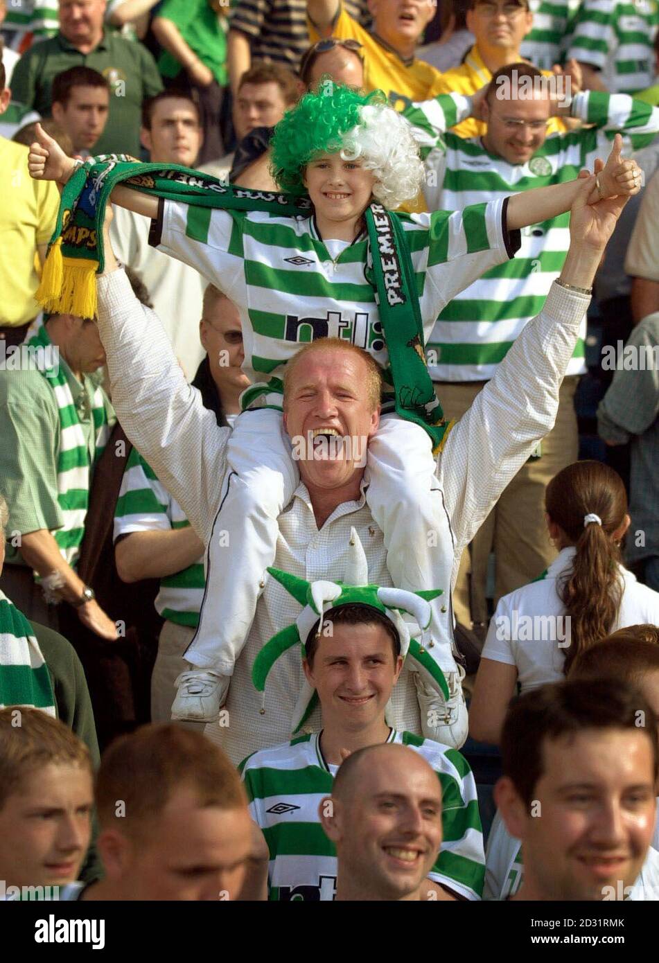 Ex-Hibs player Chic Charnley celebrates Celtic's treble win after ...