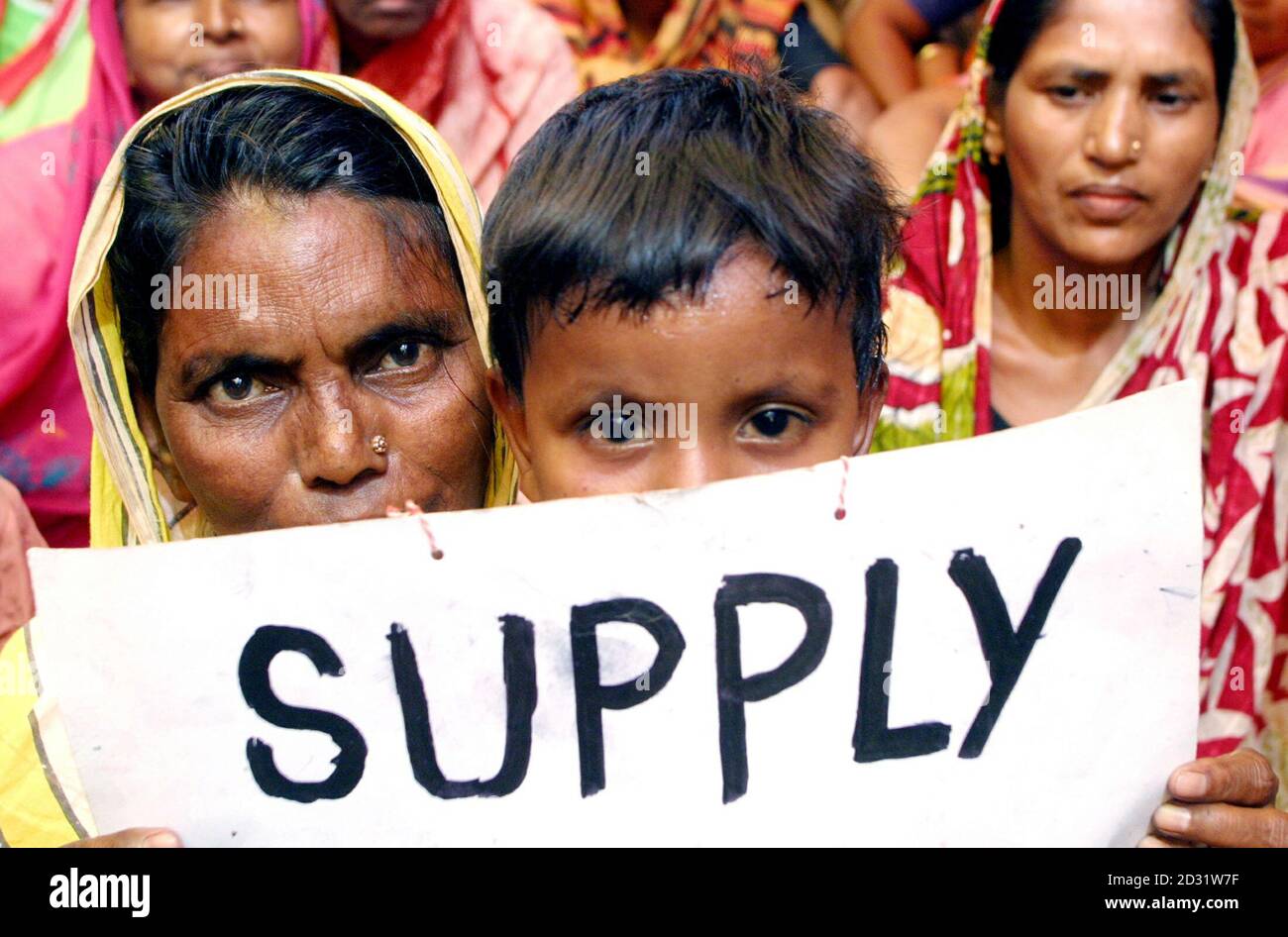 An Urdu speaking Pakistani Refugee And Her Son Take Part In A Hunger 
