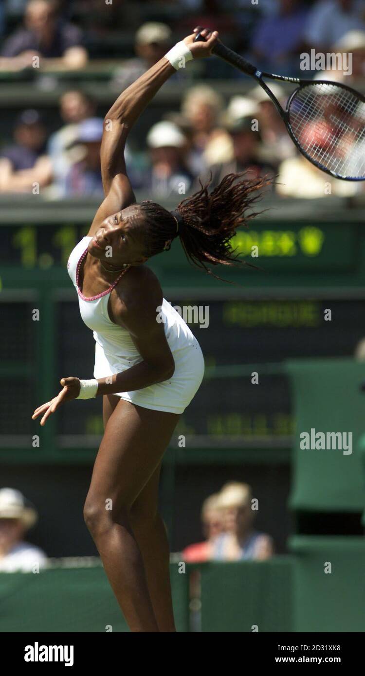 NO COMMERCIAL USE : USA's Venus Wiilliams in action against Japan's Shinobu Asagoe during the First Round match of the 2001 Lawn Tennis Championships at Wimbledon, London. Stock Photo