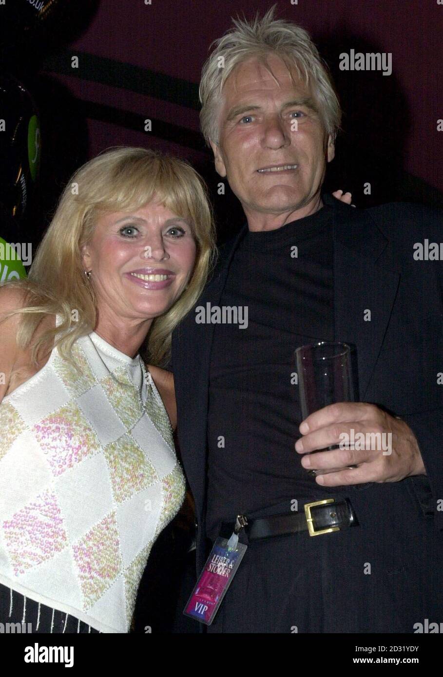 Actress Britt Ekland and actor and singer Adam Faith during a party in central London following a special all-star gala tribute to legendary songwriters Leiber and Stoller at the Hammersmith Apollo in London. Stock Photo