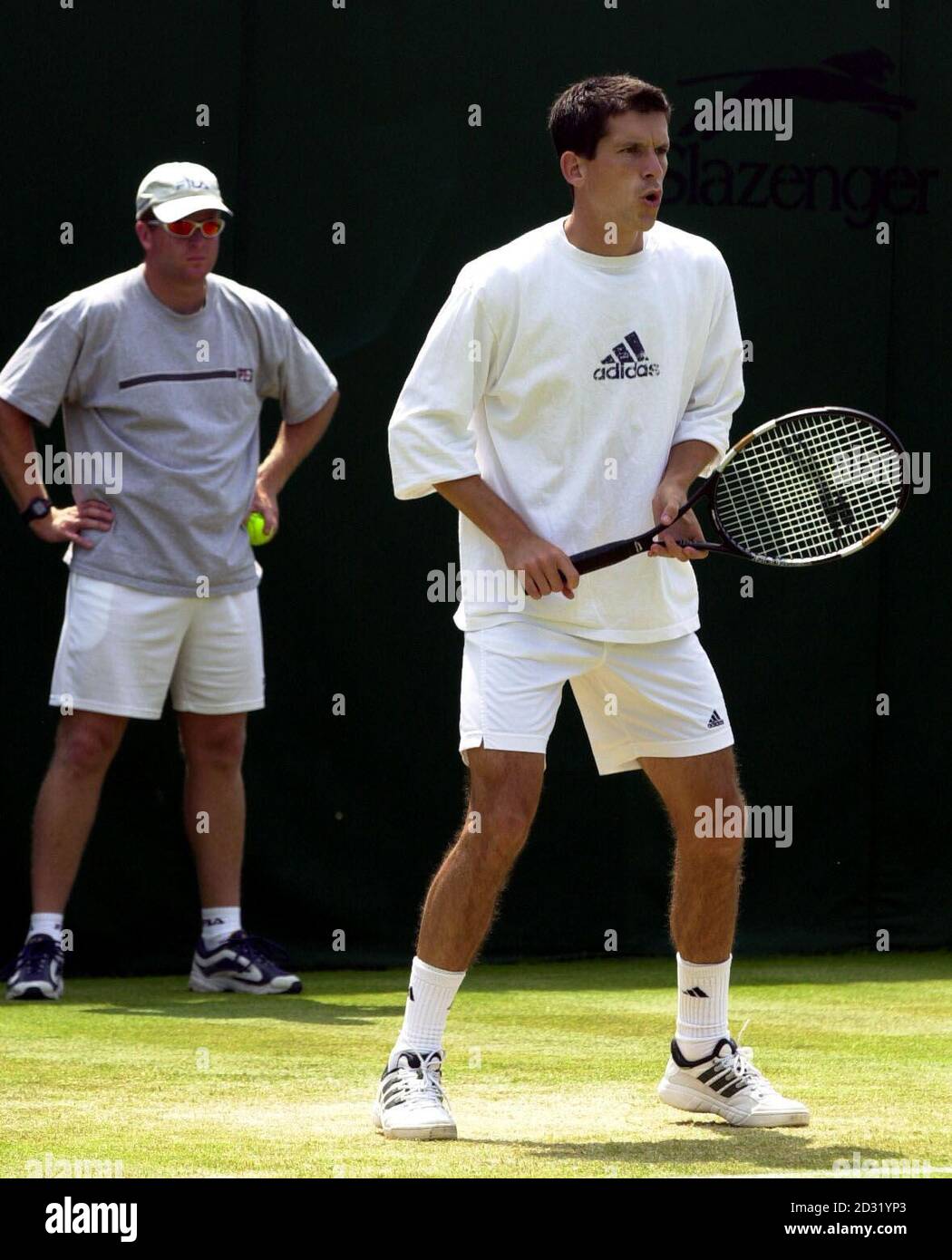 NO COMMERCIAL USE: British tennis star Tim Henman during a practice session before his match against America's Todd Martin  at Wimbledon, London. Stock Photo