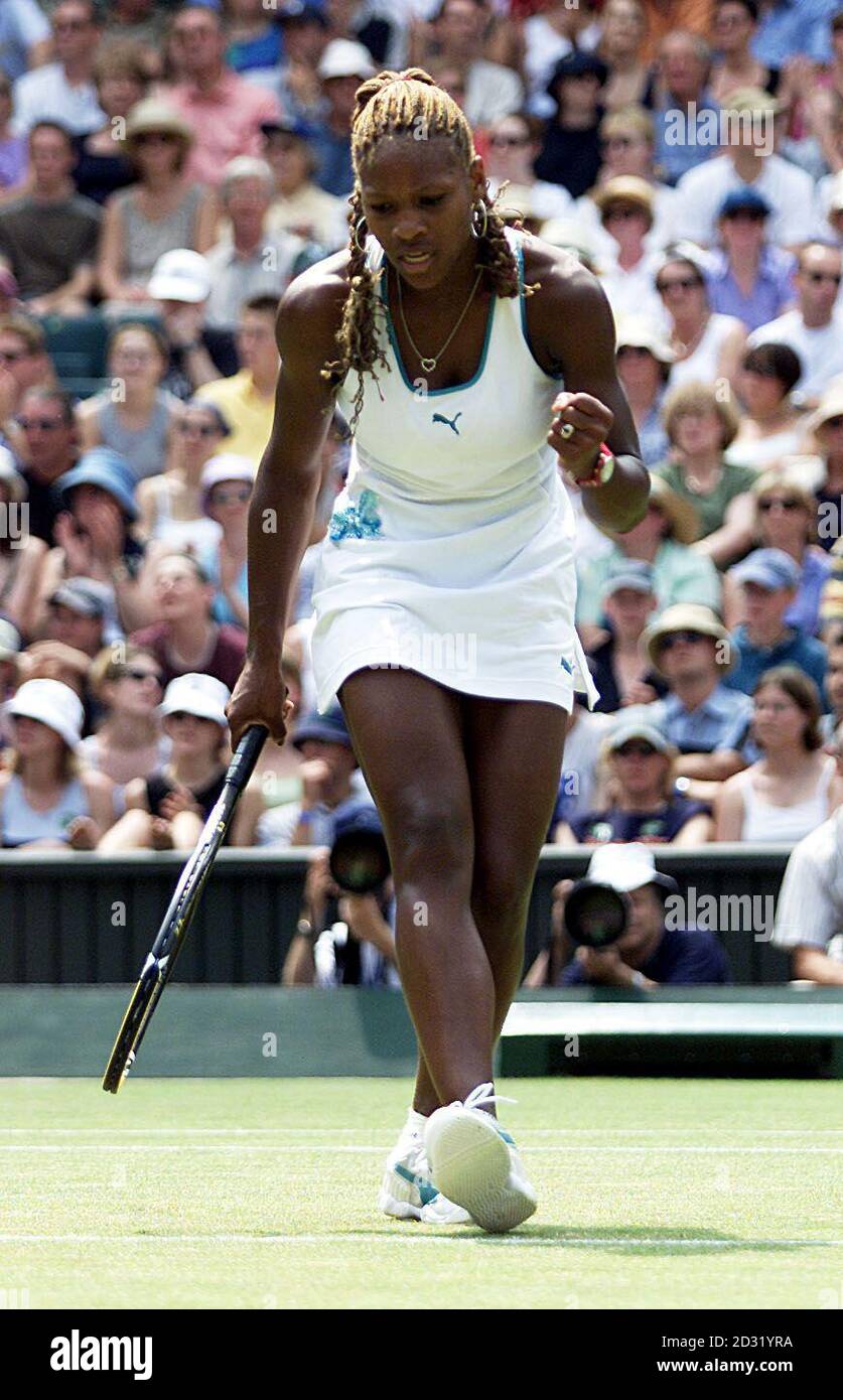 NO COMMERCIAL USE: America's Serena Williams celebrates winning the first set in her match against America's Jennifer Capriati during the 2001 Lawn Tennis Championships at Wimbledon, London. Stock Photo