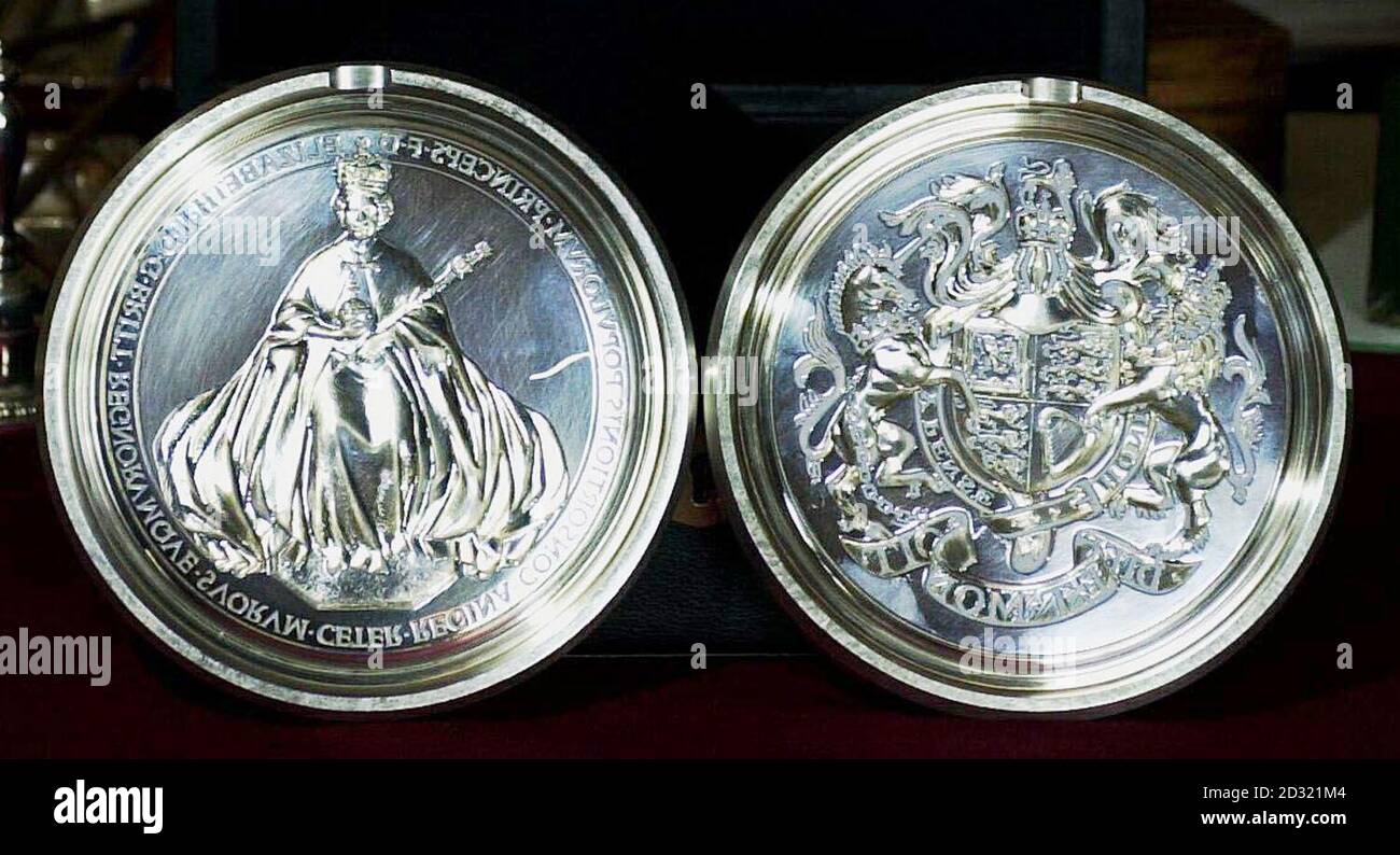The two sides of the new Great Seal of the Realm at Buckingham Palace