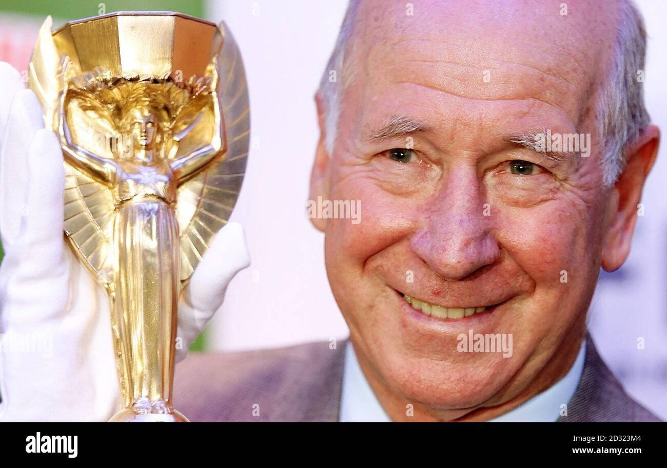 Sir Bobby Charlton one of England's 1966 winning heroes unveiled a replica of the World Cup trophy for the first time since it was commissioned. Sir Bobby,was presented with the 254,000 Jules Rimet trophy, at the National Football Museum, in Preston. * The trophy was ordered by the Football Association after the original was stolen three months before the tournament began, it was eventually discovered by a man out walking his dog and placed in a vault of a London jewellers until the final on July 30. But not since the players celebrated on the pitch at Wembley stadium, London, after being p Stock Photo