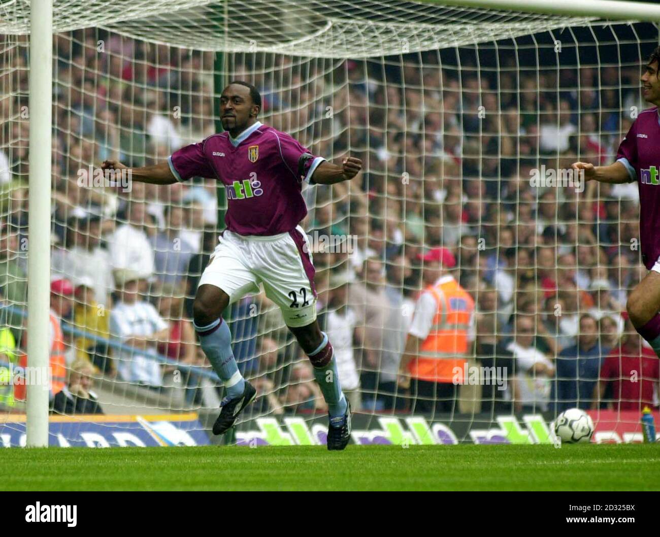 Aston Villa's Darius Vassell celebrates after scoring the first goal against Manchester United during the FA Barclaycard Premiership game at Villa Park, Birmingham. Stock Photo