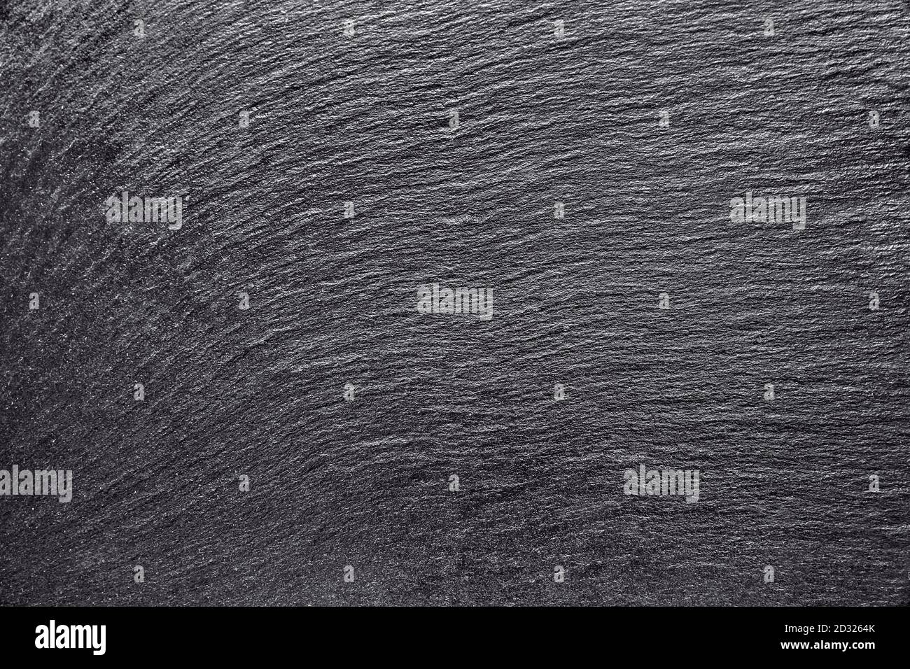 Dark grey black slate background or texture. Empty black stone background. Top view. Free copy space. Stock Photo