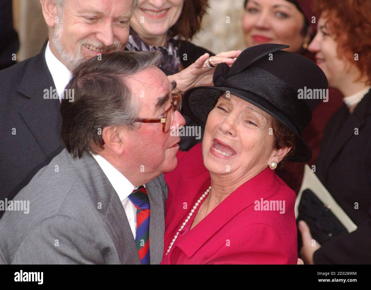 Comedian Ronnie Corbett greets Lady Myra Secombe, widow of comic genius Sir Harry Secombe, after a service of thanksgiving for Sir Harry at Westminster Abbey, London. * The Goon Show legend, who died in April from cancer at the age of 79, was remembered by family and friends at the event. The Prince of Wales was among The Goons' most prominent fans and led the tributes following his death. Sir Harry was also known for his fine tenor singing voice which he used to great effect on the religious TV programmes he presented, such as Highway and Songs Of Praise. He had battled against ill-health Stock Photo