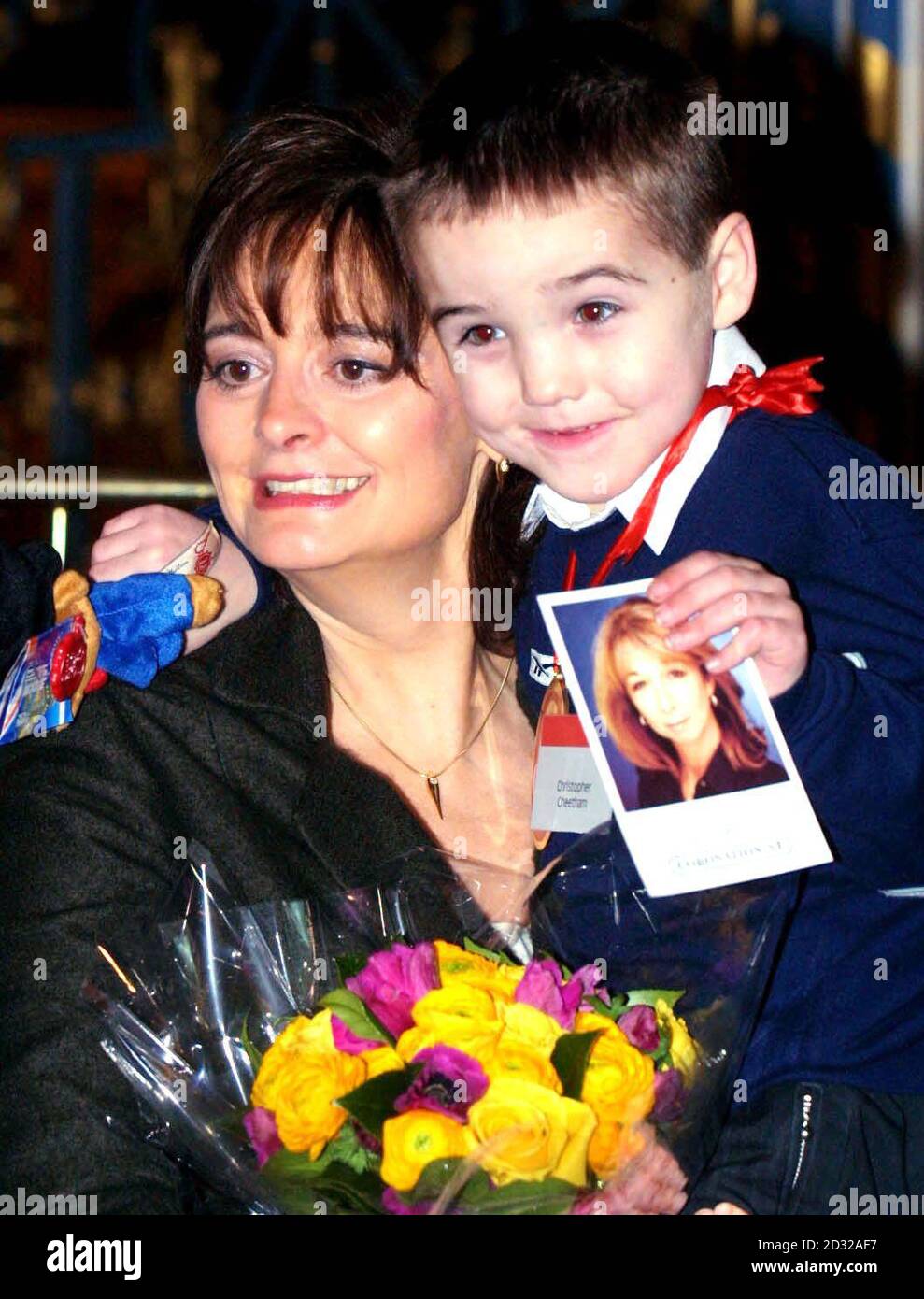 Christopher Cheetham, 7, from Manchester, with Cherie Blair, where he was one of 11 'Children of Courage' honoured for their outstanding courage at a ceremony at Westminster Abbey.  Earlier the youngsters had met the Prime Minister at Downing Street.   * Christopher was left for dead earlier this year when a hit-and-run driver knocked him off his bike. The youngster spent weeks in a coma with head injuries so horrific his own mother could not recognise him at first. Stock Photo