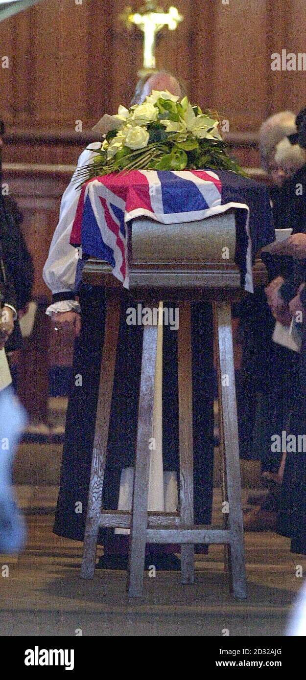 The coffin of New Zealand born yachtsman Sir Peter Blake lies draped in a Union Jack during his funeral at St Thomas-A-Becket parish church in Warblington, Hampshire. * The double Americas Cup winner Sir Peter, 53, was shot dead by masked raiders on the schooner Seamaster while it was anchored at Macapa in Brazil. Stock Photo