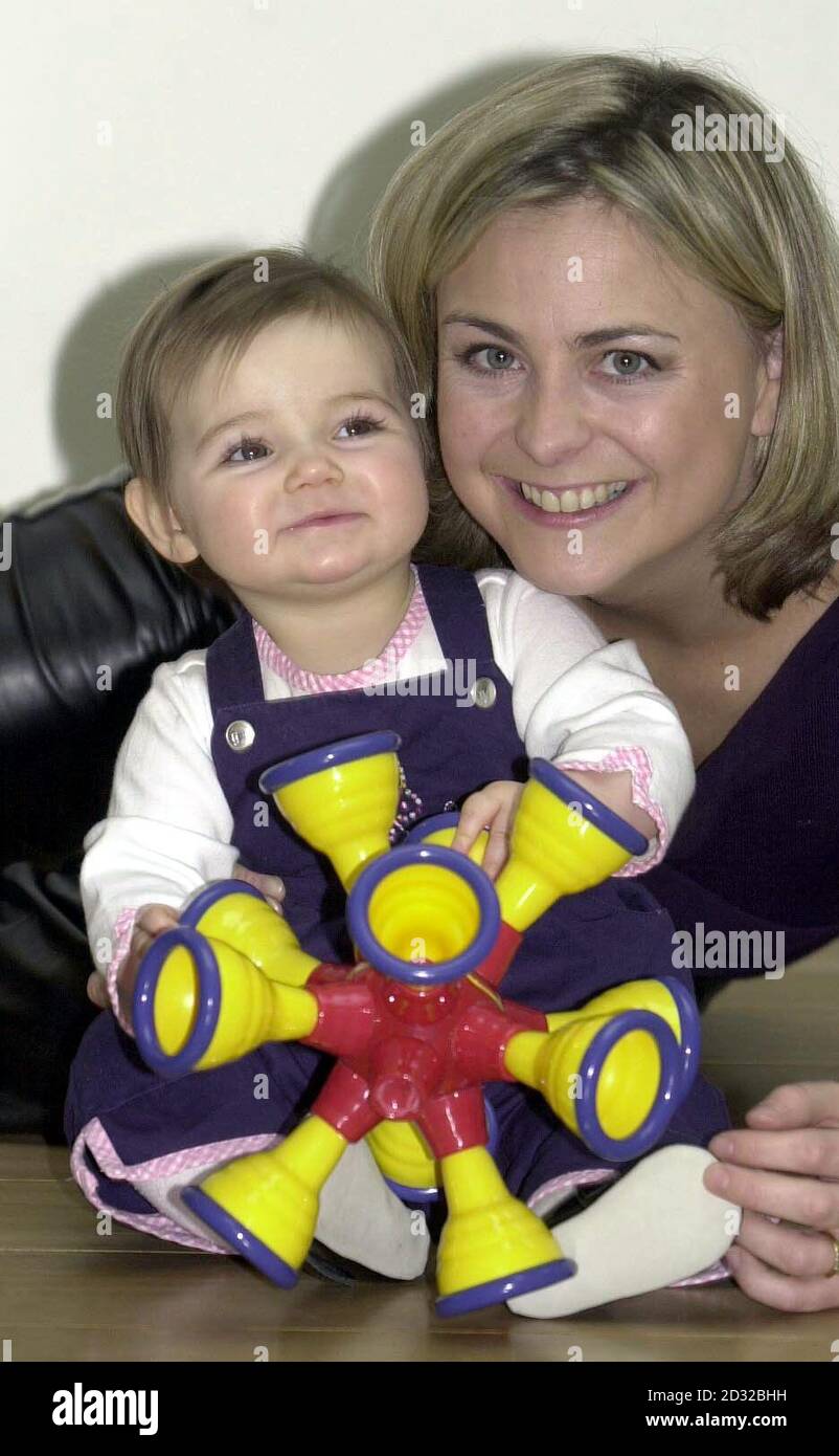 TV presenter Philippa Forrester , in London, with Sophia Webster aged 8  months, and the toy designed by Michael Cohen, who won the Fisher-Price Toy  Design Award 2002. The young designer aged