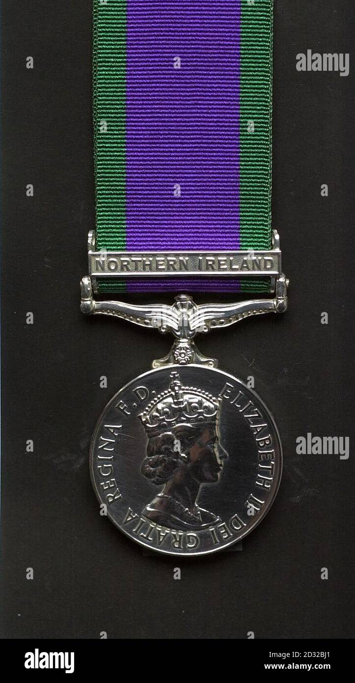 COLLECT OF MEDAL : A former soldier who served in Northern Ireland today, sent his General Service Medal to Tony Blair, angry that Sinn Fein MPs are now allowed to use House of Commons facilities. Eric Brown, 54, from Colchester, Essex,   * served three tours between 1971 and 1974, as a trooper with the Royal Scots Dragoon Guards and as a lance corporal in the Royal Electrical and Mechanical Engineers.  He sent his medal to the Prime Minister, with a home-made certificate addressed to Mr Blair, for 'degrading the honour, bravery and loyalty of British soldiers over the last 30 years'. Eric hol Stock Photo