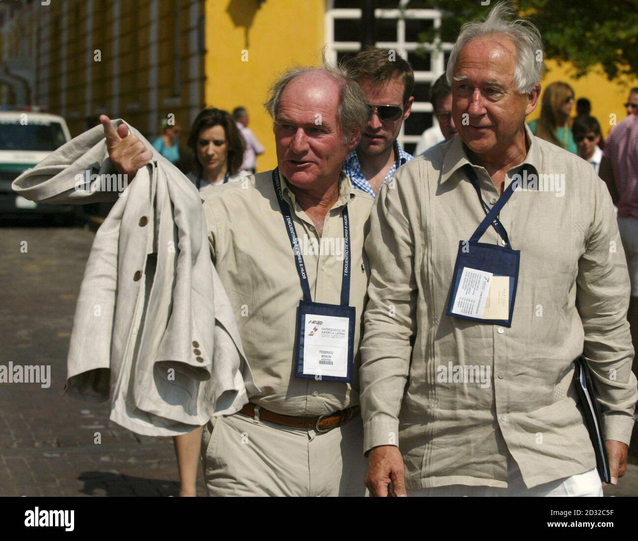 Argentine millionaire Federico Braun (L) and Chile's Horst Paulmann walk  after a meeting with Colombia's President Alvaro Uribe in Cartagena March  10, 2009. Some of Latin America's richest businessmen are meeting in