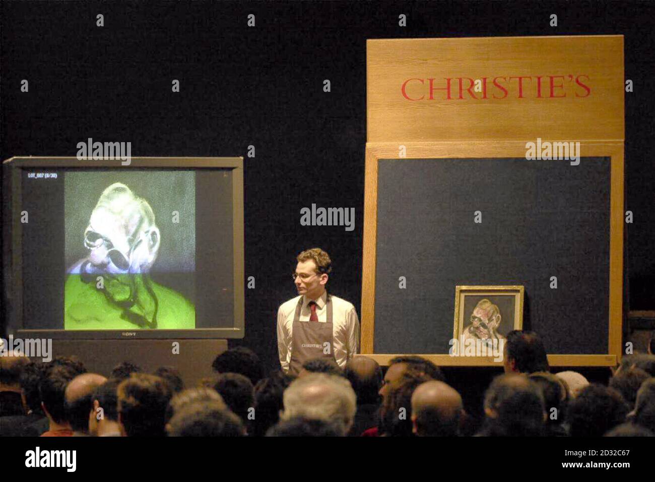 A painting by Francis Bacon, titled 'Portrait of Man in Blue' which sold at Christie in London for 810,000. The work is one of three in the sale by Bacon's in a sale of post-war art. Stock Photo