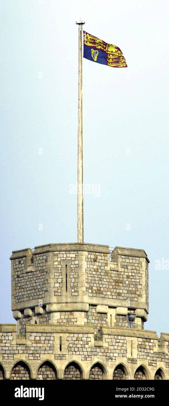 The Royal Standard flies over Windsor Castle, where Britain's Queen Elizabeth II was mourning the death of her younger sister, Princess Margaret, who died aged 71. Stock Photo