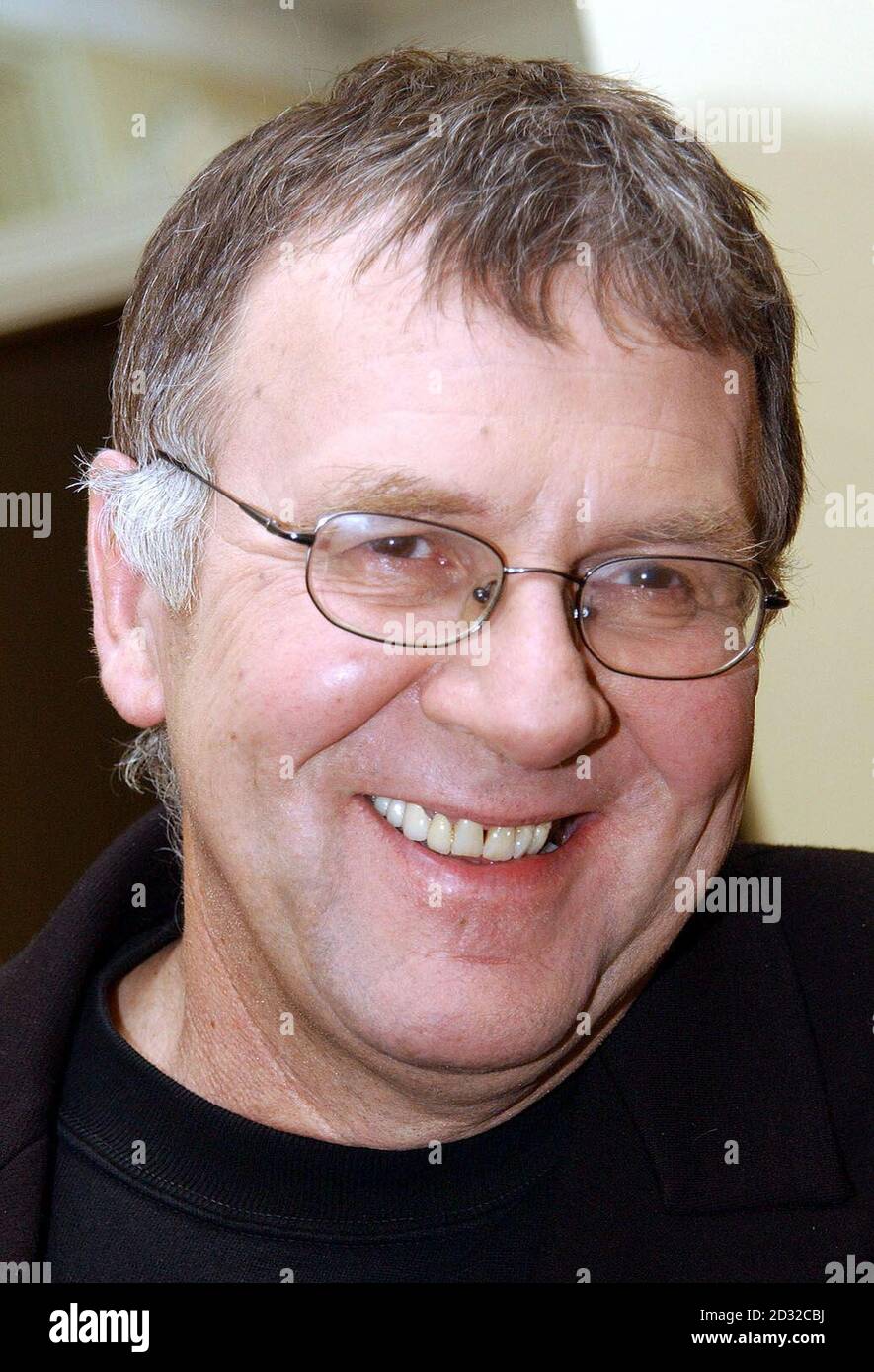 British actor Tom Wilkinson poses for photographers at Claridges in London, after he was nominated for the Best Actor Oscar for his role in the film 'In The Bedroom' during the Oscar nominations announcement in Los Angeles earlier. Stock Photo