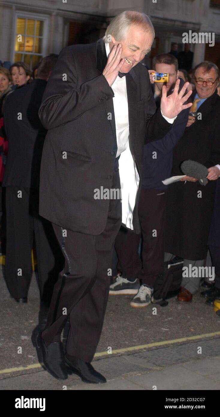 Sir Tim Rice arrives at Claridges in central London to attend the wedding of Joan Collins arriving at Claridges Hotel in London for the wedding of actress Joan Collins to Percy Gibson. Stock Photo