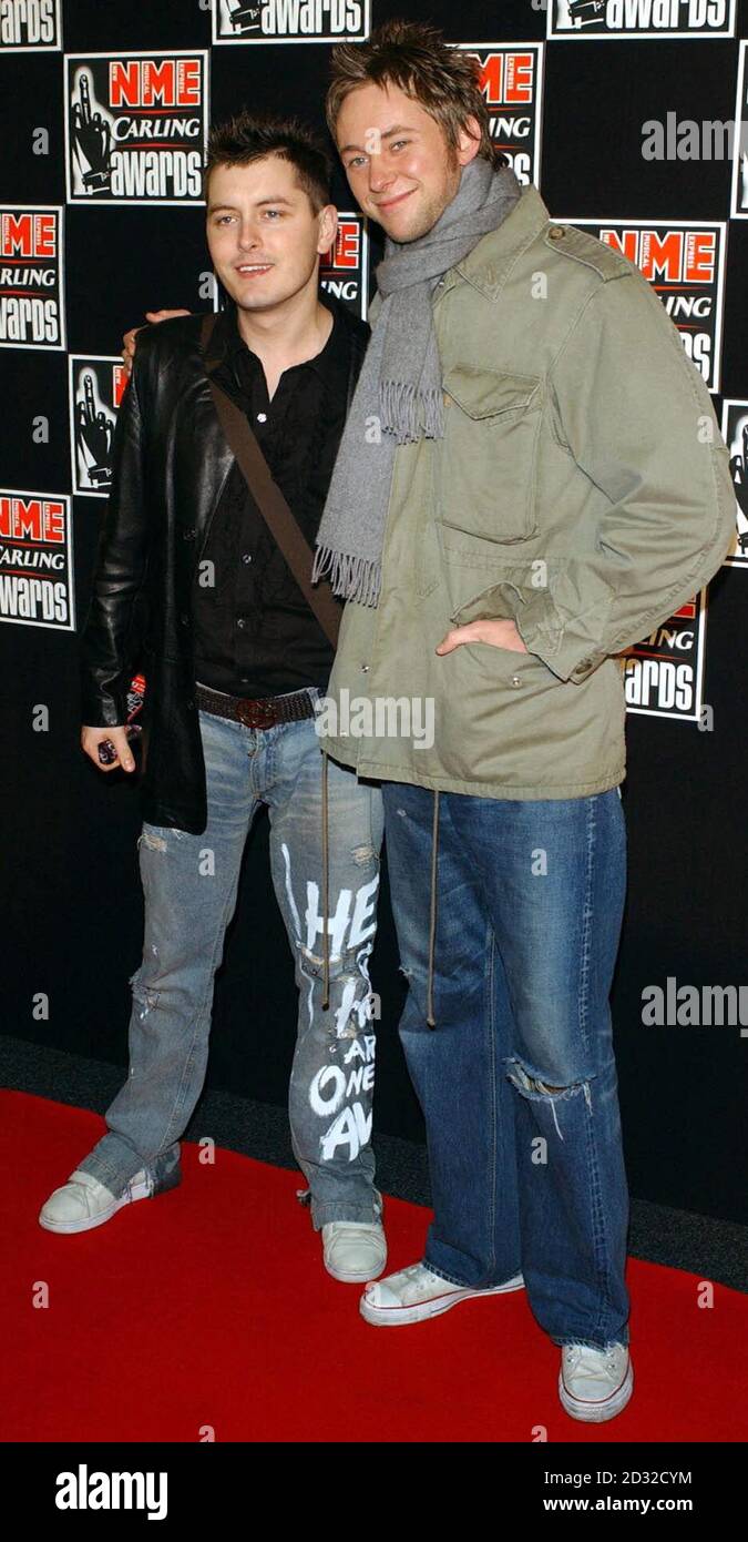 SMTV presenters Brian Dowling (left) and James Redmond arriving for the NME (New Musical Express) Carling awards at Planit 2000 in Shoreditch, East London. Stock Photo
