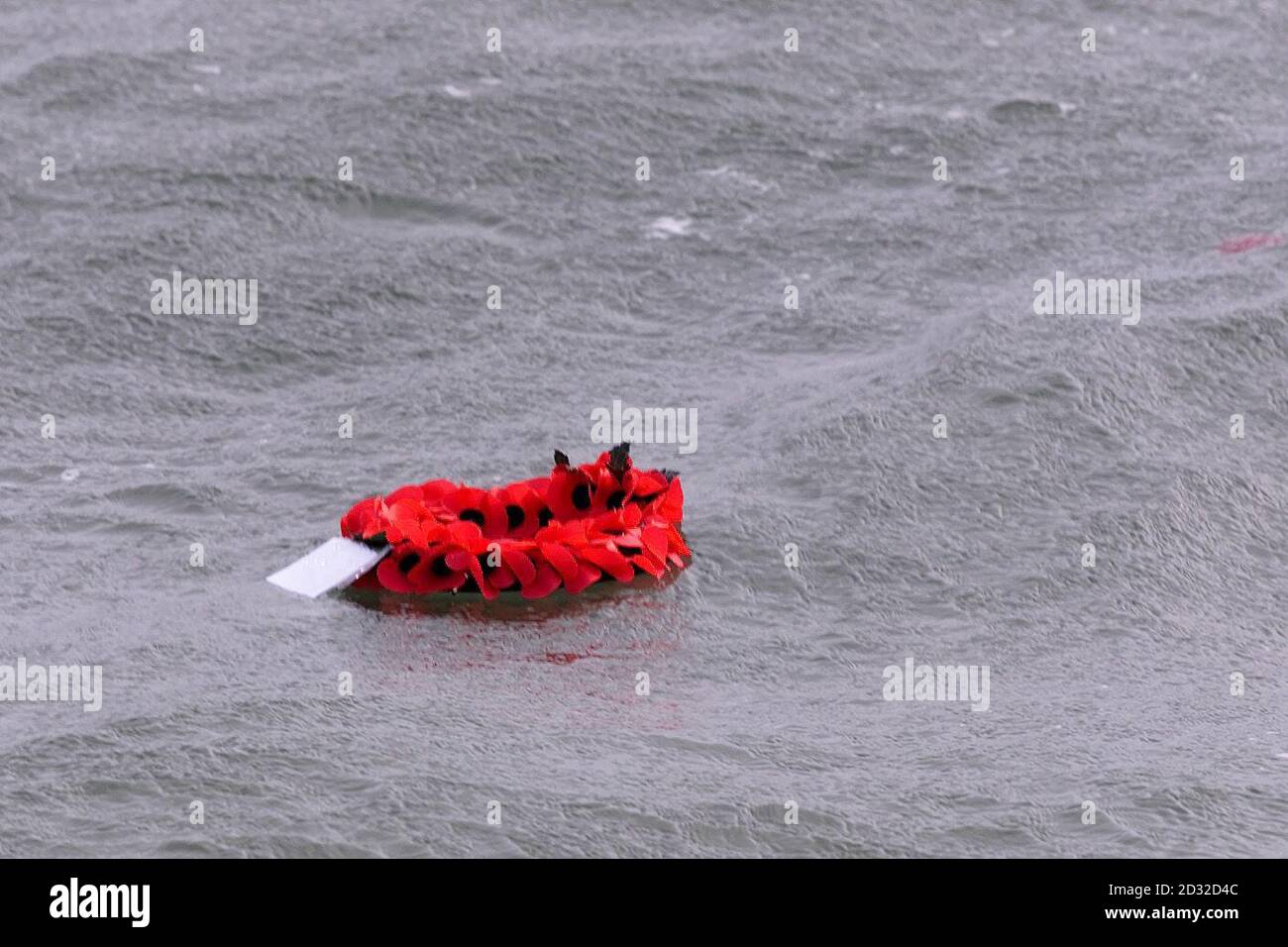 A Wreath floats over the spot  today 2.3.02 where British Submarine H5 was sank  off the coast of  North Wales on March 2 1918,  killing all 27 crew on board. Only years later did it emerge that the vessel was sunk by a British  merchant ship,  *   - the SS Rutherglen - which had mistakenly believed the H5 to be a German vessel. The men on board were even paid a bounty for sinking an enemy ship - not  knowing that the men they had left to die were in fact allies.The first ever  memorial service for the crew was held in Hollyhead today 2.3.02 . Stock Photo